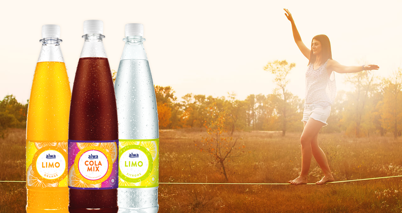 alwa Limonaden und Frau, die auf einem Seil balanciert