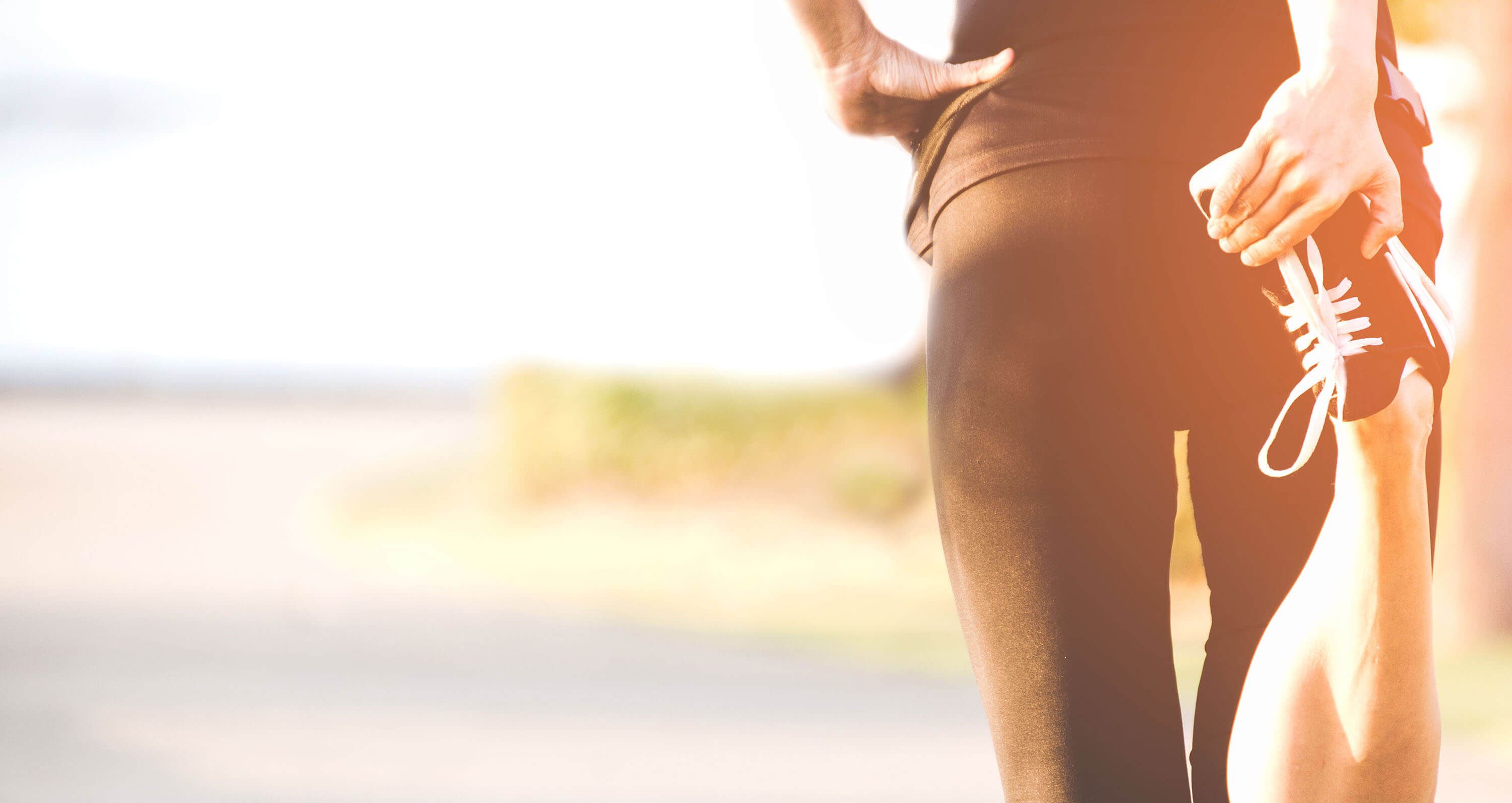 Frau beim Stretching